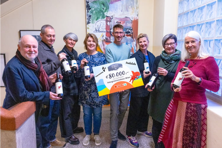 €80,000 is donated to integration efforts by Heinrich Winery and SPAR Austria.